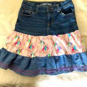 This custom made skirt is 15” long with a 22” waist.